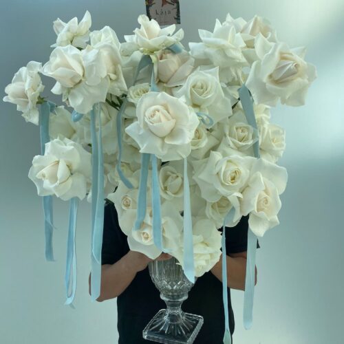Alternative view of white bloom vase arrangement