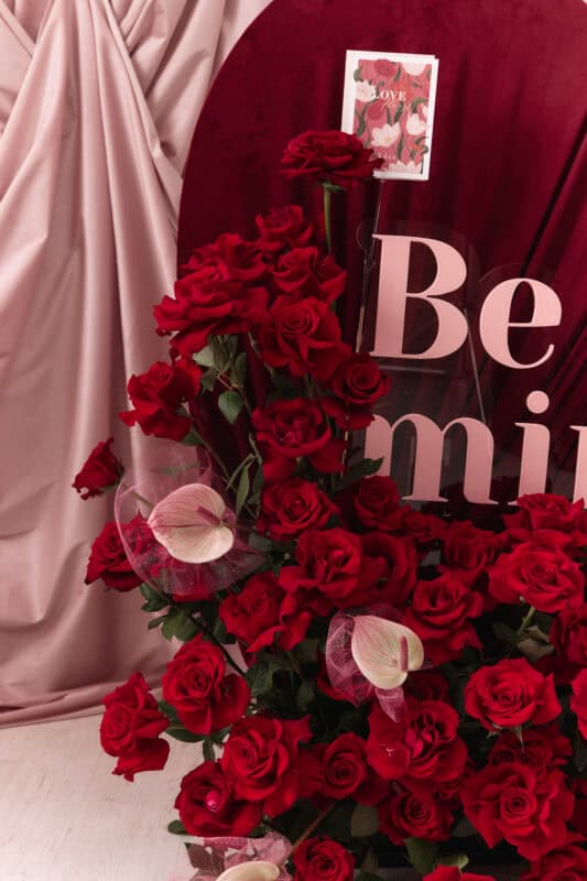Elegant red roses bouquet with lush blooms and delicate accents, perfect for Valentine's Day or romantic gestures.