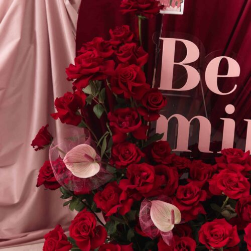 Elegant red roses bouquet with lush blooms and delicate accents, perfect for Valentine's Day or romantic gestures.